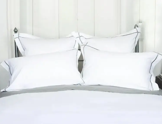 Apa yang boleh saya lakukan sekiranya lembaran sateen kapas biasa hotel saya menjadi kuning dan menjadi lebih berat dengan setiap cuci?